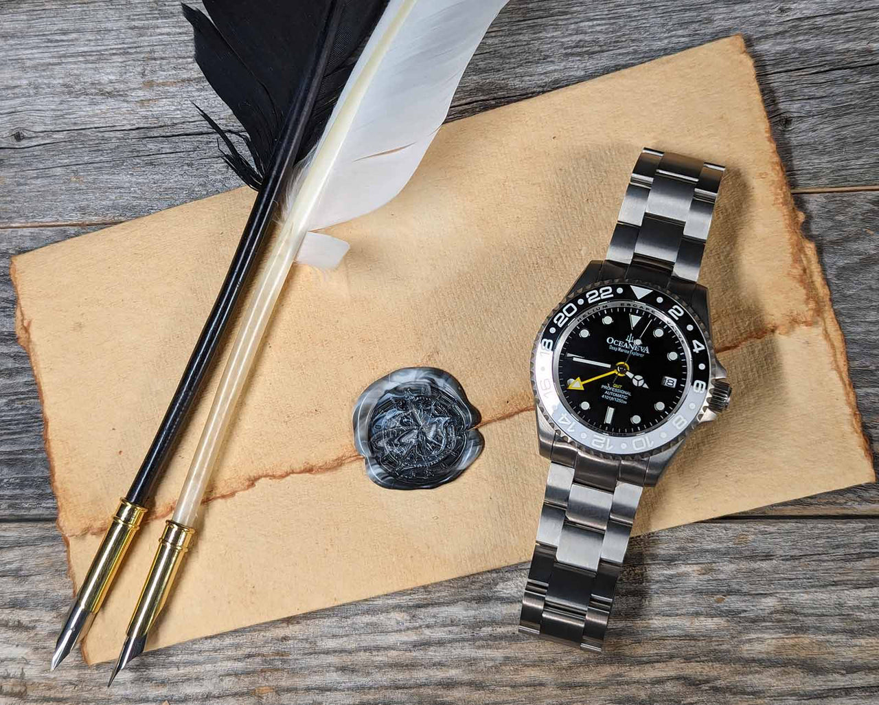 Oceaneva titanium dive watch white and black with quill, parchment and wax seal