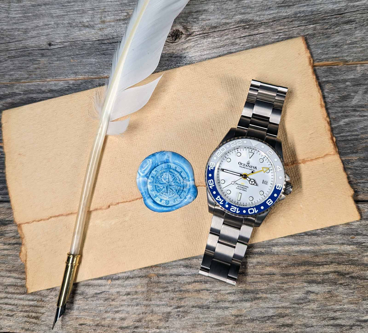 Oceaneva titanium dive watch blue and white with quill, parchment and wax seal