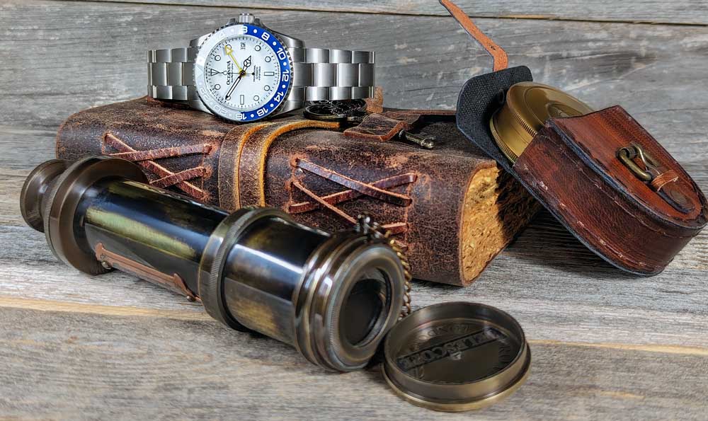 Luxurious Oceaneva Titanium GMT Watch set against natural backdrop