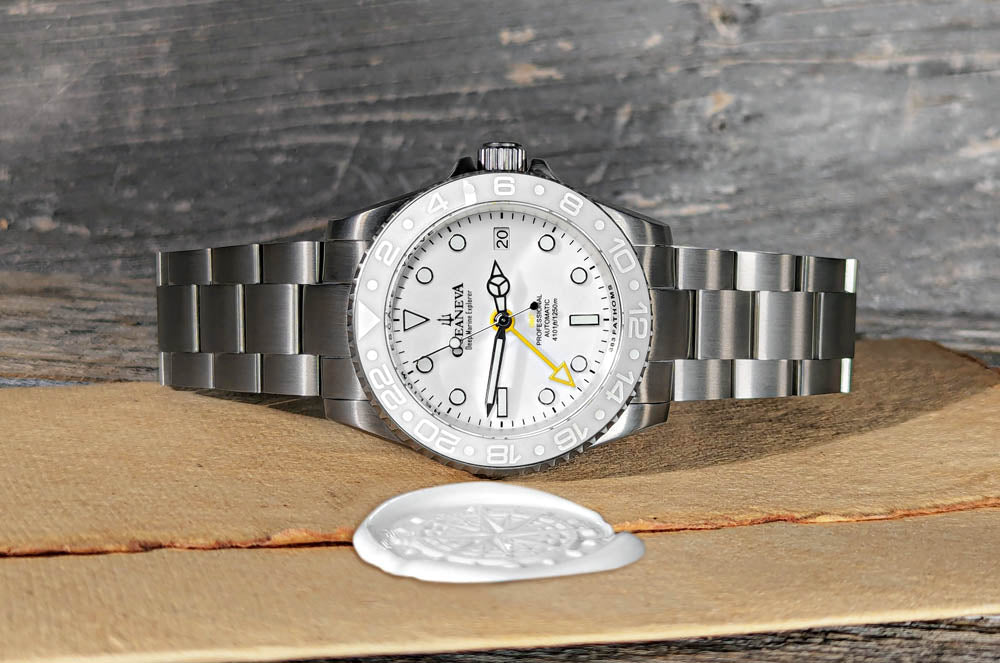 Elegant Oceaneva Titanium GMT Watch with a white ceramic bezel