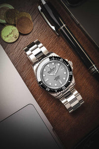 Thumbnail for Oceaneva 1250M Dive Watch Gray On Bracelet Wooden Table