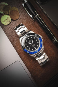 Thumbnail for Oceaneva 1250M Dive Watch Blue and Black On Bracelet Wooden Table