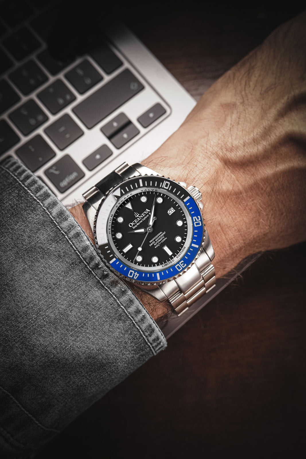 Oceaneva 1250M Dive Watch Blue and Black On Wrist Denim Sleeve