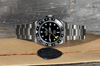 Thumbnail for Luxurious Oceaneva Men's GMT Titanium Watch pictured with vintage wax seal