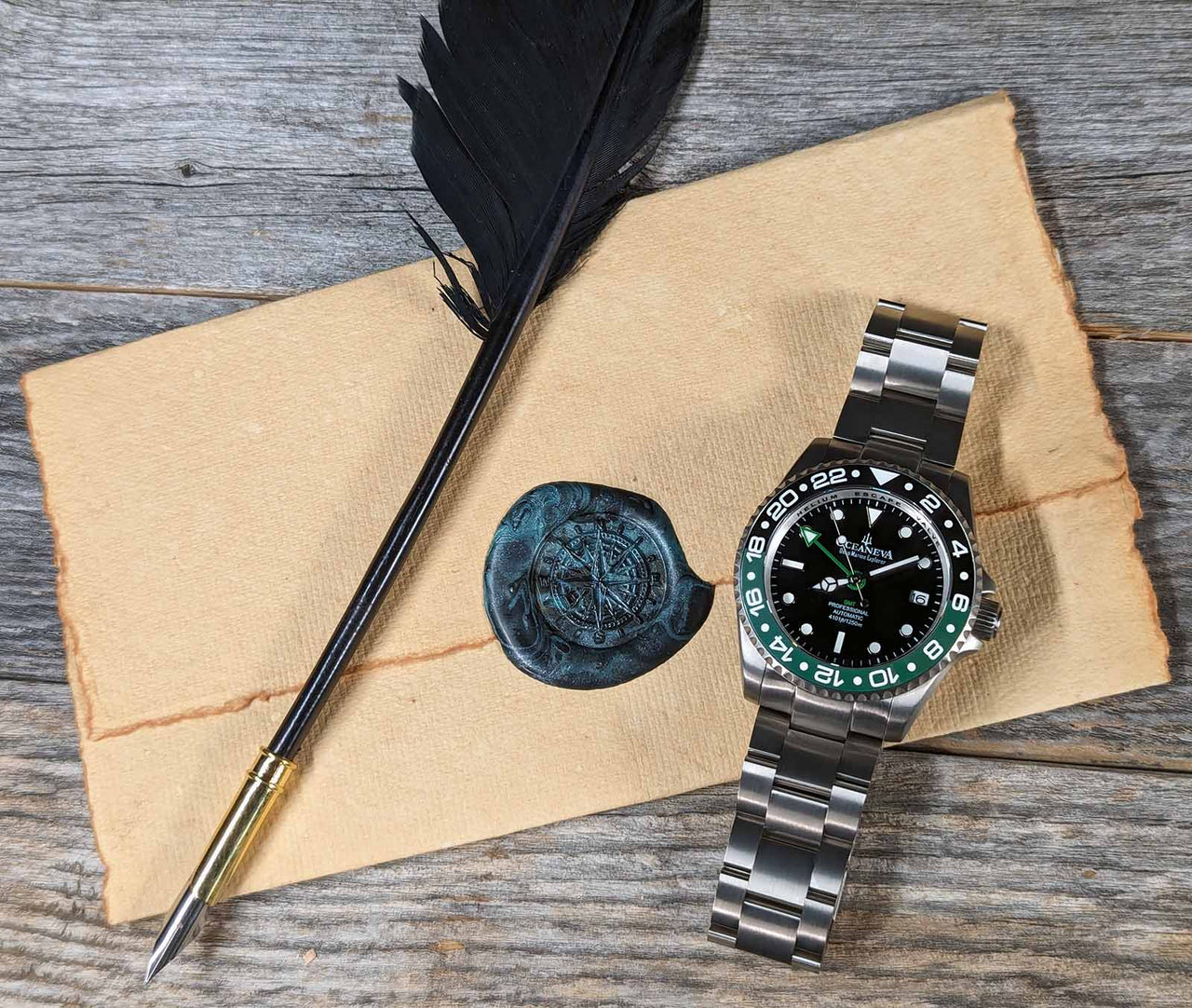 Oceaneva titanium dive watch black and green with quill, parchment and wax seal