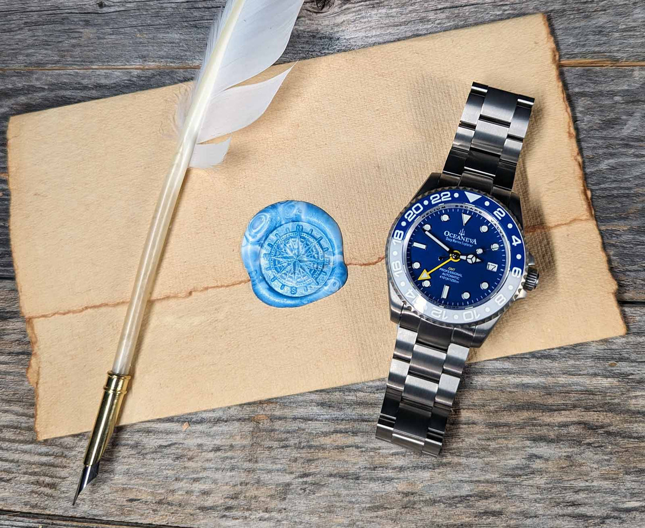 Oceaneva titanium dive watch white and blue with quill, parchment and wax seal