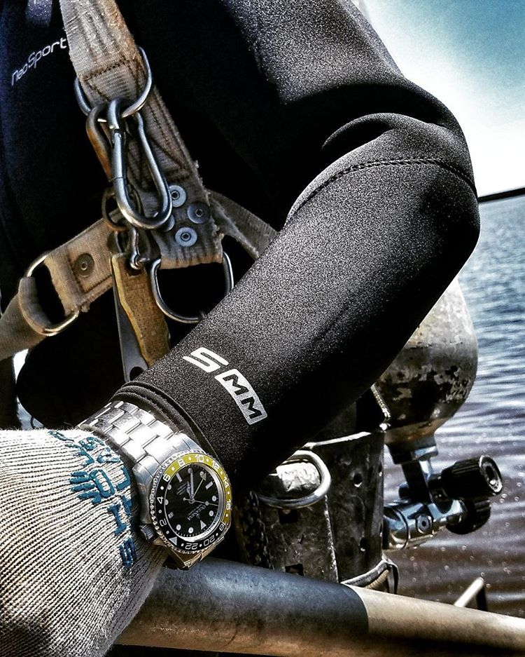 Oceaneva 1250M GMT Dive Watch Black And Yellow On Wrist 2