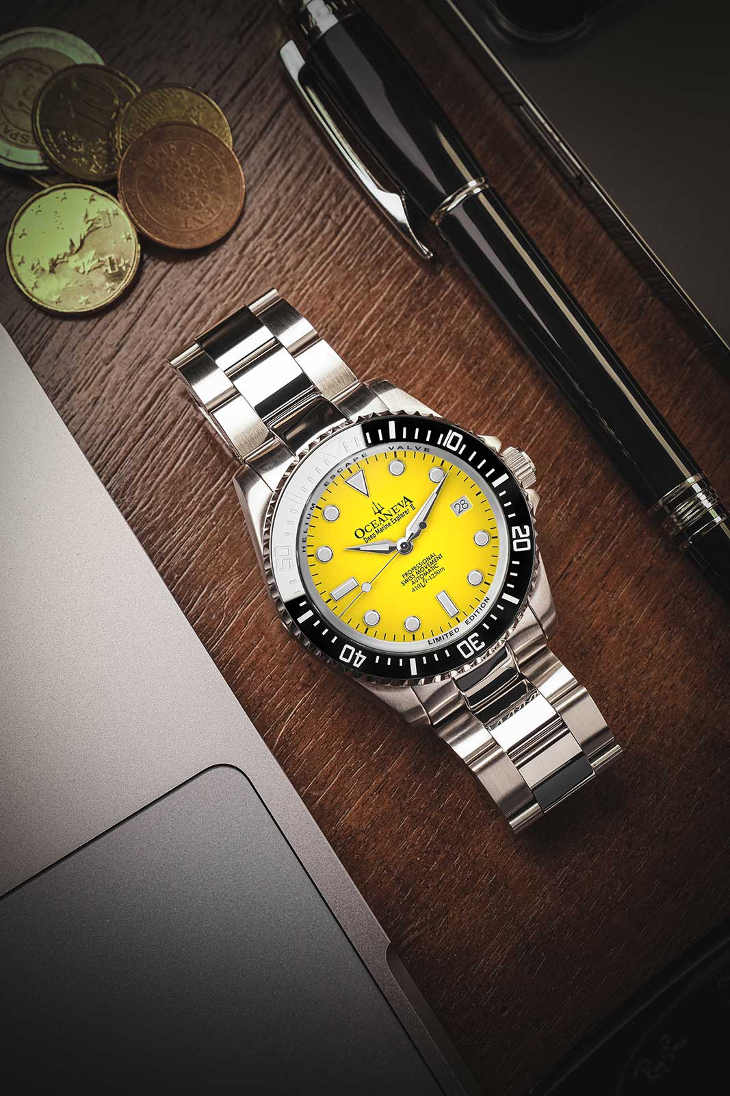 Oceaneva 1250M Dive Watch Yellow On Bracelet Wooden Table