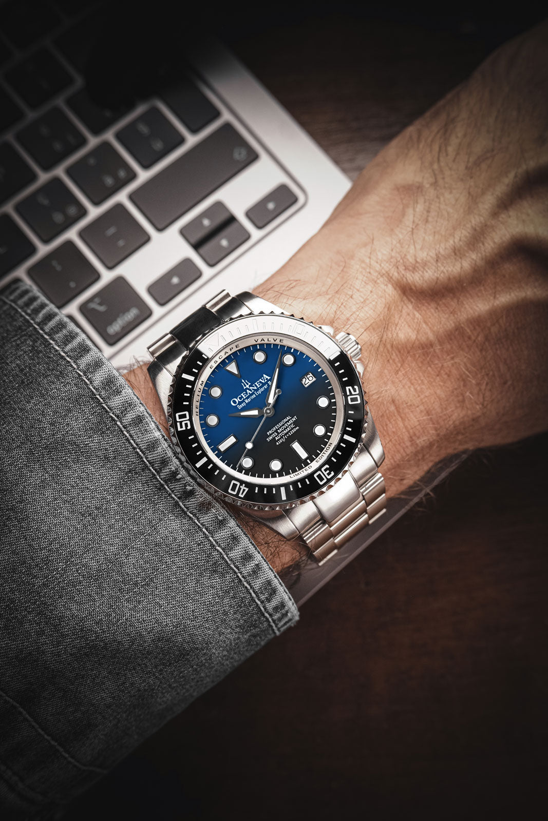 Oceaneva 1250M Dive Watch Blue Black On Wrist Denim Sleeve