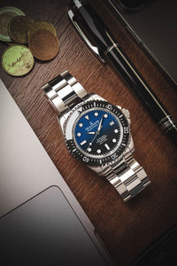 Thumbnail for Oceaneva 1250M Dive Watch Blue Black On Bracelet Wooden Table