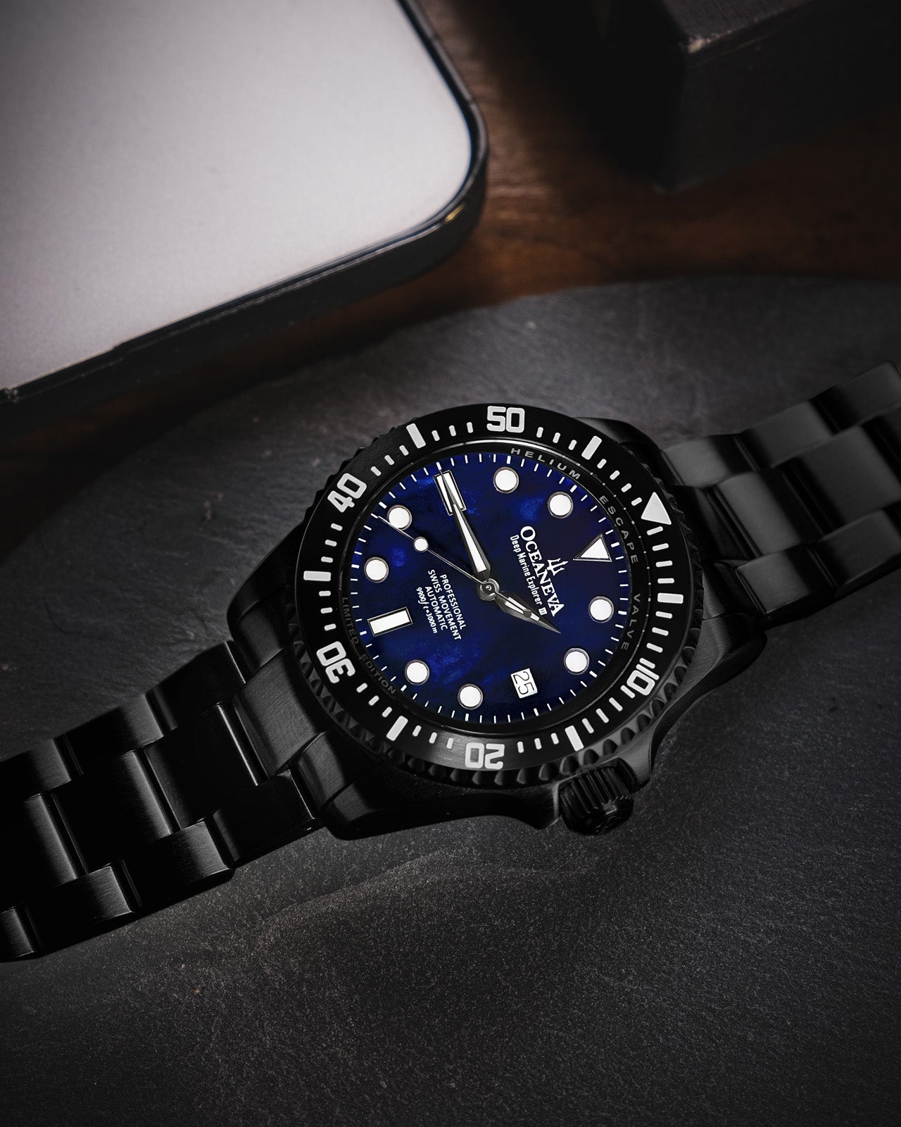 Oceaneva 3000M Dive Watch Navy Blue Mother of Pearl Lying Flat