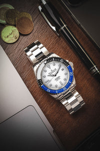 Thumbnail for Oceaneva 1250M Dive Watch Blue/Black Bezel White Dial On Bracelet Wooden Table