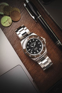 Thumbnail for Oceaneva 1250M Dive Watch Brown Bezel Black Dial On Bracelet Wooden Table