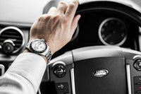 Thumbnail for Oceaneva™ Men's WaveRacer™ 500M Pro Diver White Dial Panda Chronograph Watch Wearing while driving a  car