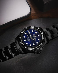 Thumbnail for Oceaneva Men's Deep Marine Explorer III 3000M Pro Diver Watch Navy Mother Of Pearl Dial Black IP - BKIIINBMP200BK 3000m, 3000M Dive Watch, 316L Stainless Steel, Automatic Watch, BGW9 Swiss Super-Luminova, Dive Watch, Sw200-1 Swiss Automatic Movement